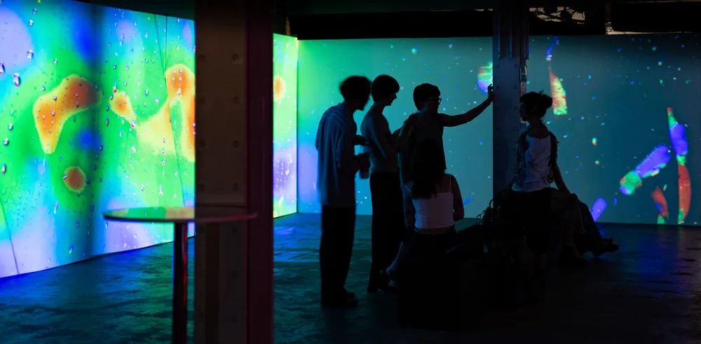 Colourful projections filling a room at BYOB Berlin