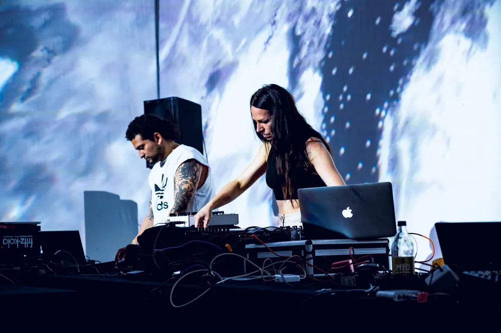 Performers behind an audiovisual setup