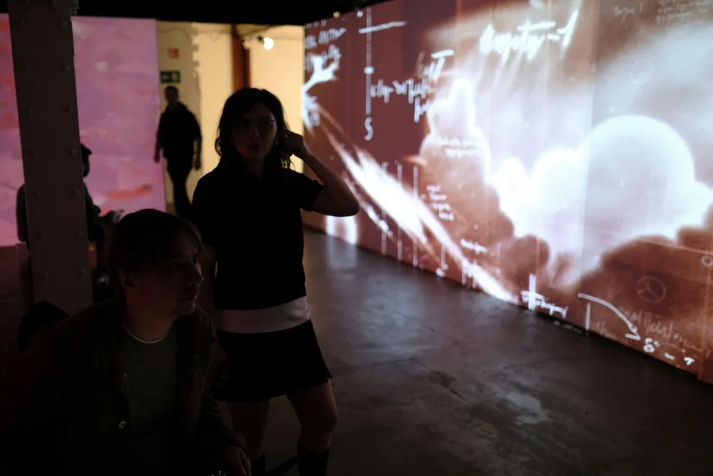 Crowd watching projections at BYOB Berlin